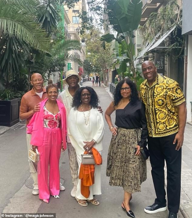 Among the Johnsons' friends are Samuel L. Jackson (third from left) and his wife, LaTanya