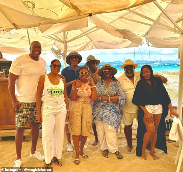The Johnsons & Jacksons had lunch on a Spanish beach with other friends, eating lobster