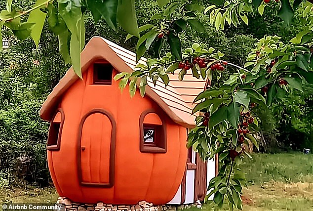 The Magic Pumpkin is a bright orange, round house that looks like a giant winter squash