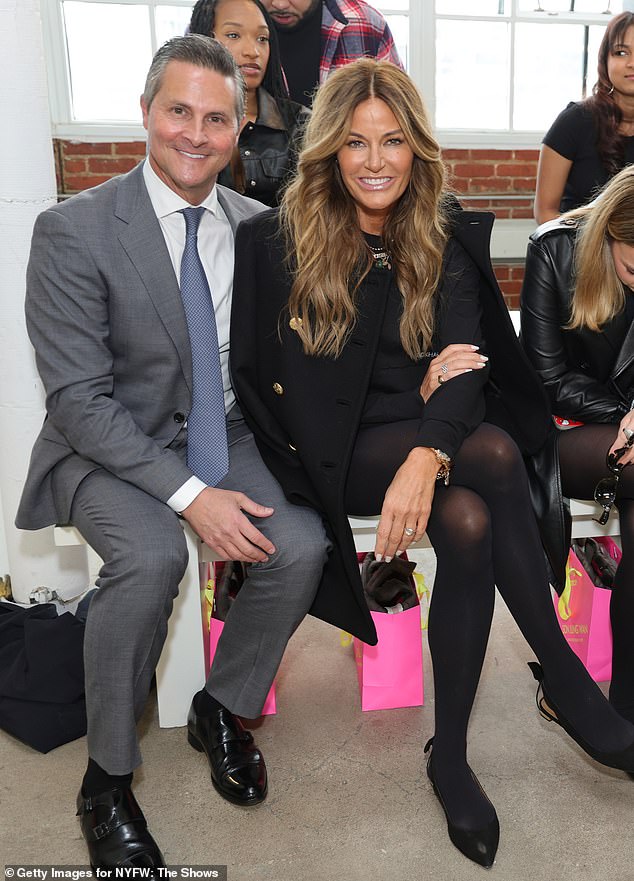 The reality TV personality and financier prepared for a ceremony on June 29; pictured with Scott in February
