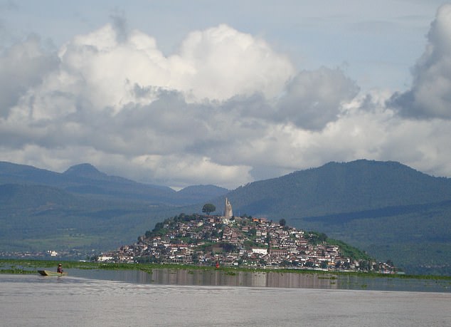 Droughts accelerated by climate change and illegal water theft have helped transform the lake's Janitzio Island (above) into a peninsula