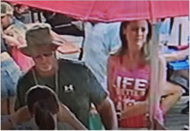 One of the participants - the man on the left - is now apparently cooperating with police, who say he is not considered a suspect. The woman on his right was also wanted but has not been found as of Thursday, police said.