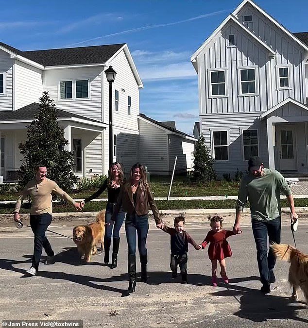 The identical twin sisters, who have the same job, car and dog, have now moved into identical houses - right next door to each other