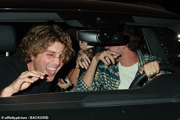 The giggling duo appeared to be in good spirits after their meal and were later spotted in a car with two other friends