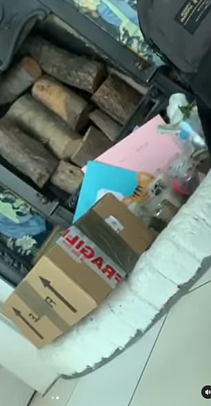 The video shows Michelle surrounded by presents and a bottle of wine