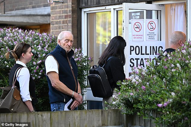 He waited patiently in line with other members so he could cast his all-important vote