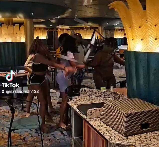 Chairs flew through the air during the brawl, which took place in the dining room of a Carnival Cruise ship