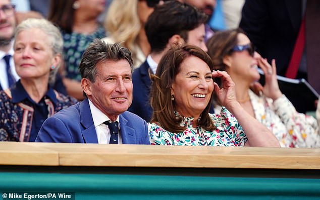 Dressed in all their finery, the radiant couple looked in good spirits as they arrived side by side for the prestigious event in London. Carole pictured chatting with Sir Sebastian Coe