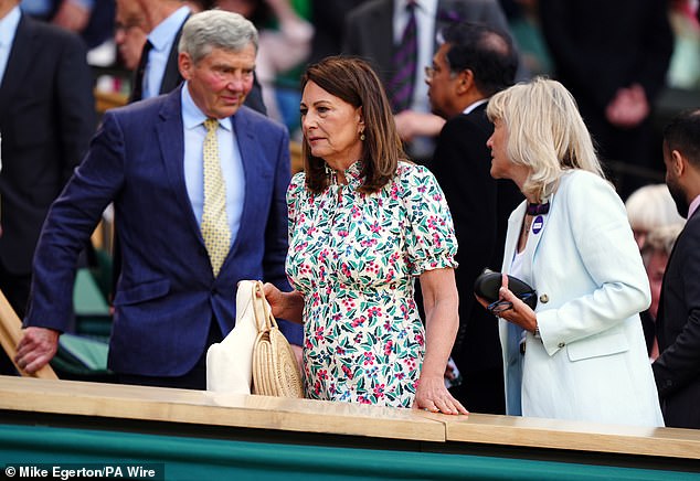 Kate Middleton's mother also carried a woven handbag, creating the perfect summer ensemble