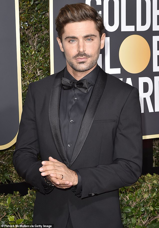 Efron pictured at the Golden Globe Awards in January 2018, three years before his fall