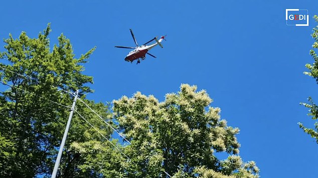 A helicopter was used by search and rescue teams to locate and recover the woman's body