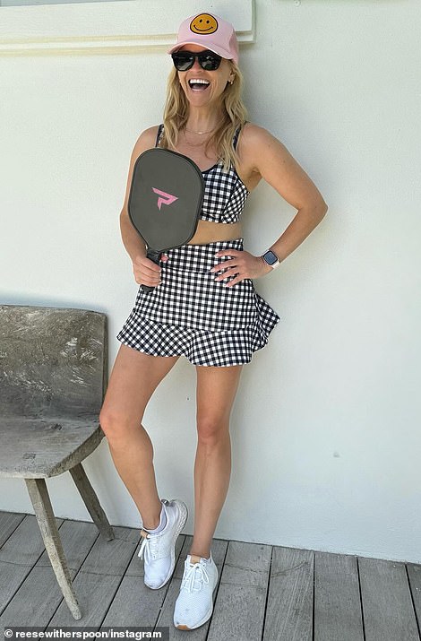 The Legally Blonde actress also posed in this adorable black and white outfit to play Pickleball