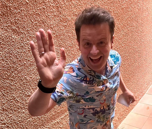But Ant and Dec made a point of waving to the families who had gathered around the pool to greet them and gave high-fives to children who had come to watch