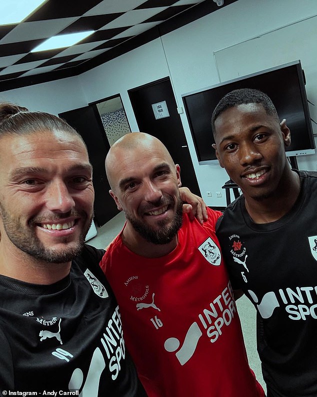 The 35-year-old posed for pictures with his teammates as he returned to pre-season training