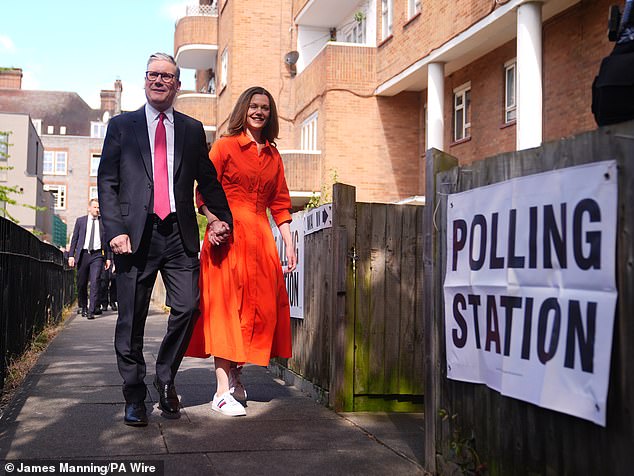 Sir Keir arrived with his wife Victoria to cast their vote at a polling station in their Holborn and St Pancras constituency in north London