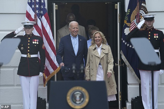 President Joe Biden (left) and first lady Jill Biden (right) arrive on the South Lawn for the first of two Fourth of July appearances
