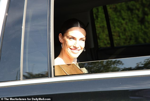 90210 alumna Jessica Lowndes was also spotted, seen with a friendly smile from her own car