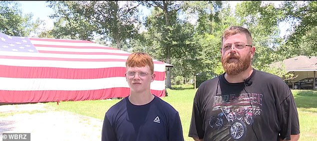 The flag was a gift from a Marine veteran who served four tours in Iraq and it was very emotional for the father and son to hang the flag