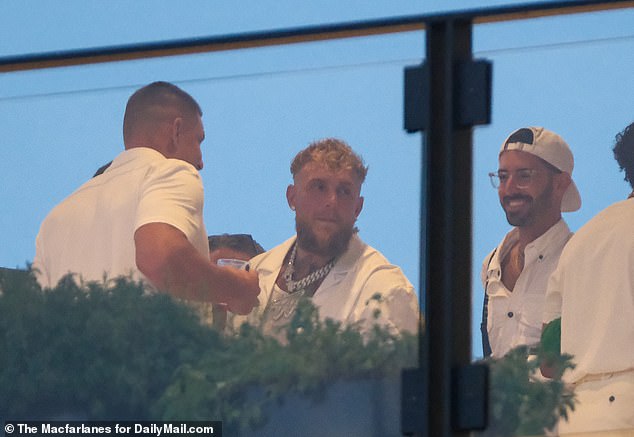 Inside, Paul was seen talking to Gronkowski as they continued to enjoy their evening