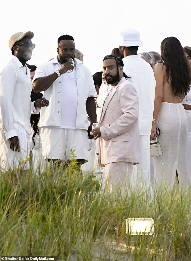 Rapper French Montana seemed to deviate slightly from the dress code by wearing a white and pink suit