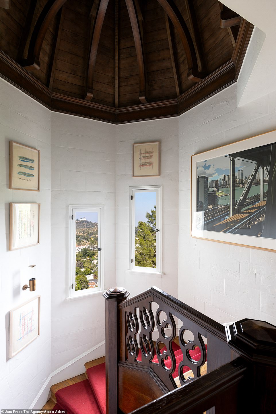 The striking wooden details on the ceilings also match the intricate railings