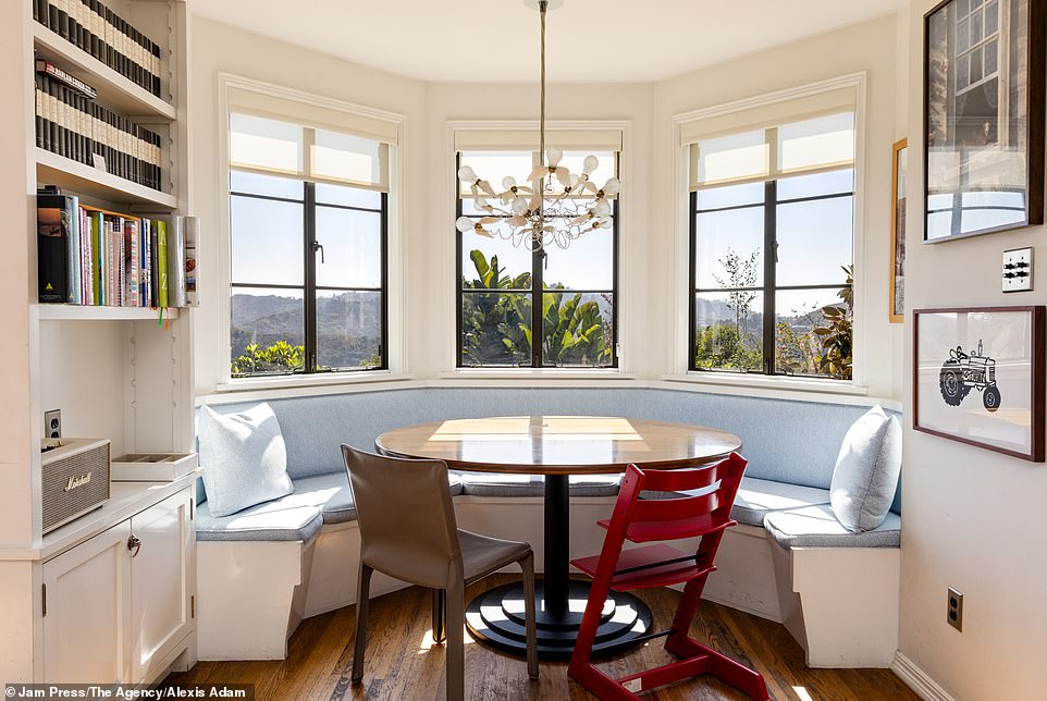 One of the property's dining areas offers 180-degree views of the Hollywood Hills and plenty of sunlight to enjoy while having your morning coffee