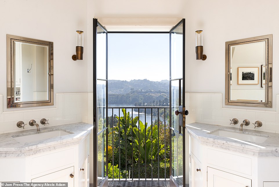 One of the bathrooms has a private balcony where homeowners can stop to enjoy the view while getting ready for their day