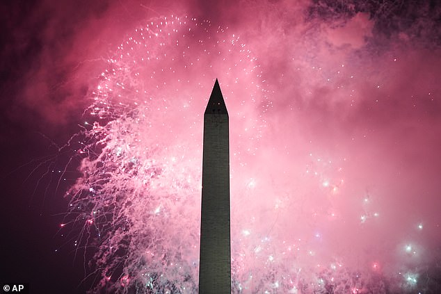 Fireworks erupted on the National Mall over the Lincoln Memorial in Washington DC