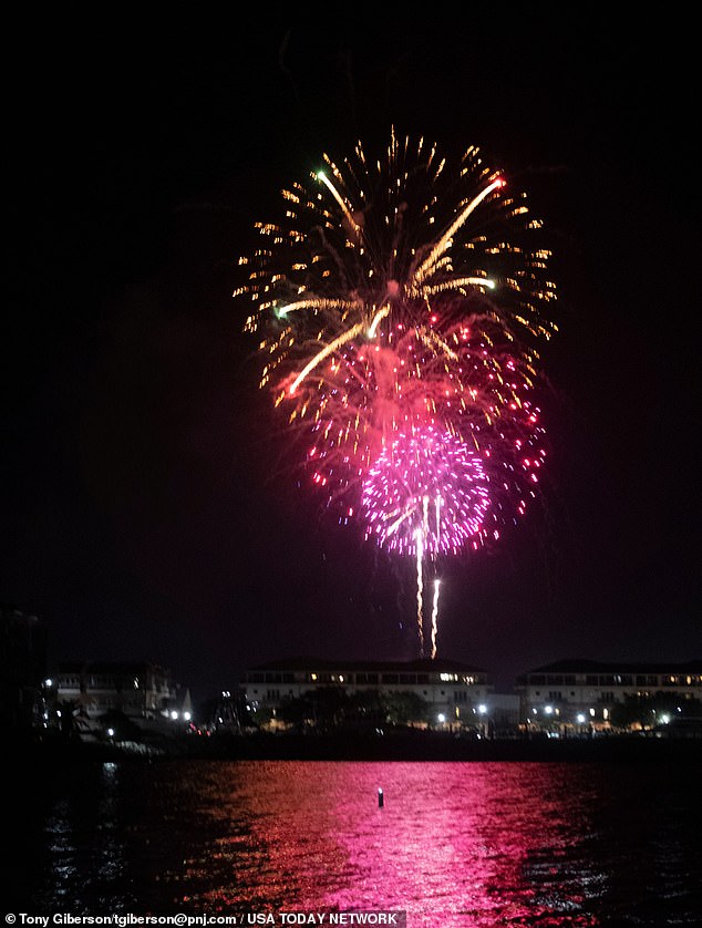 Images taken in Penascola show fireworks being set off as the nation celebrated Independence Day