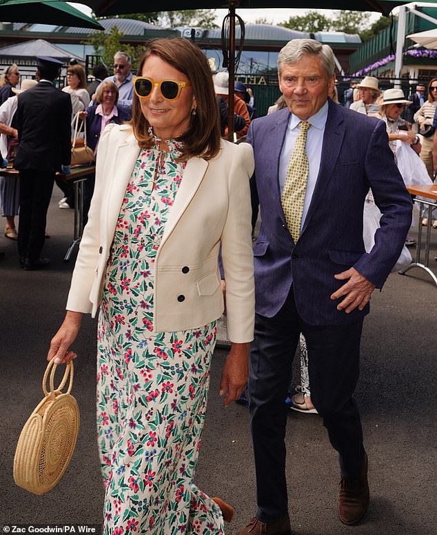 Carole Middleton looked elegant as she arrived at the tennis tournament in a floral dress alongside her husband, Michael Middleton