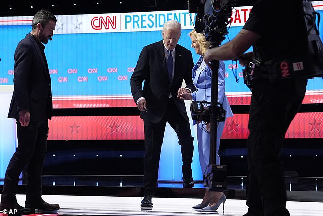 First Lady Jill Biden helps her husband take a step back during CNN debate after his poor performance