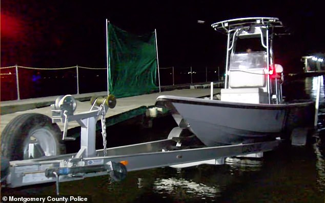 One of the boats believed to be involved in the drowning, after being towed to the dock