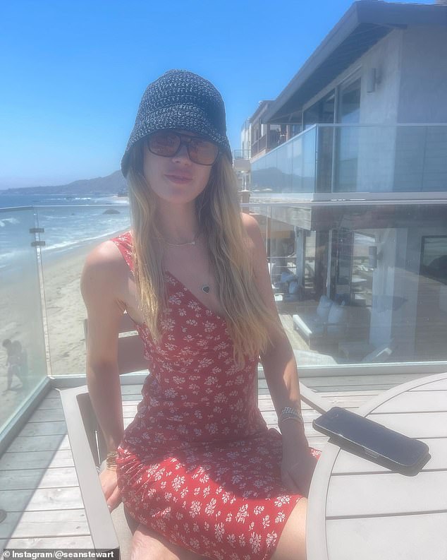 Sean also posted photos of his new love on Instagram. She wore a red dress and a bucket hat with sunglasses while sitting on a balcony at a beachfront restaurant in Malibu