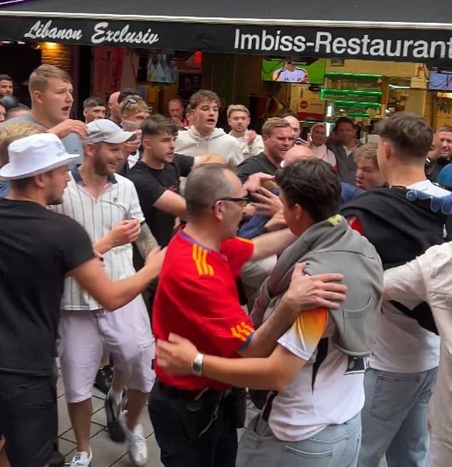 1720210280 119 England and Germany fans clash in violent scenes in Dusseldorf