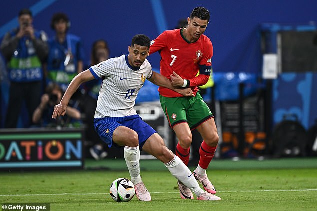 Cristiano Ronaldo (right) was well contained by the French defense during the match