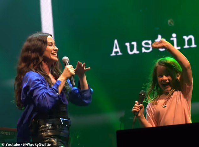 The mother-daughter duo then sang the chorus together, again inspiring many in the audience to sing along.