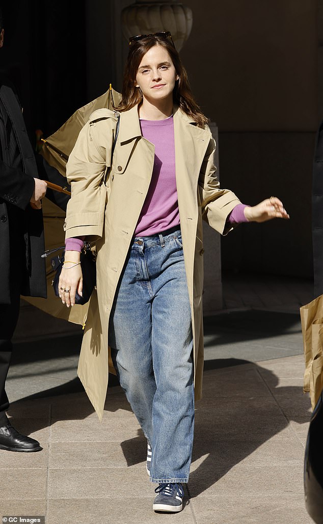 Earlier this week, Emma and the man were spotted leaning in for a kiss on the street while she was away for a few days (photo taken in February)