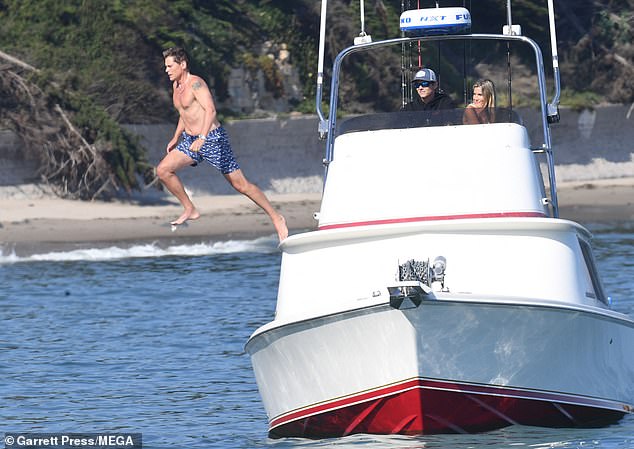 A great action shot caught Rob jumping himself off the boat