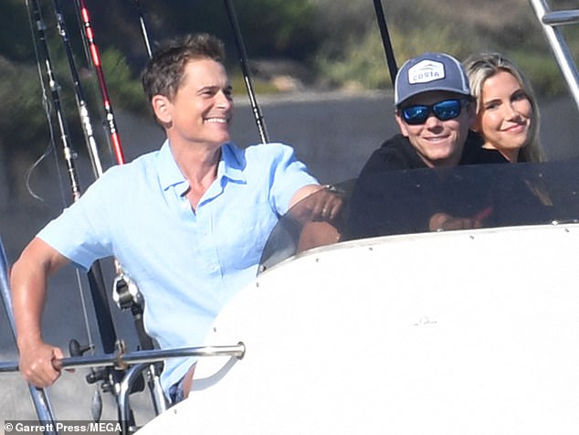 The star was joined by friends as he relaxed on Matt's fishing boat