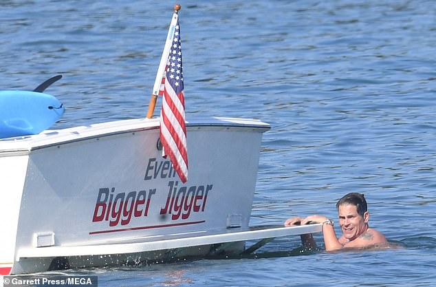 Rob swam back to the boat after his amazing jump