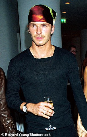 It's not the first time David and Victoria Beckham's son has channeled his dad's '00s style. Earlier this year, Romeo took inspiration from David again, wearing a patterned satin bandana for a night out at London's Chiltern Firehouse, 25 years after the former England footballer rocked it (pictured in 1999)