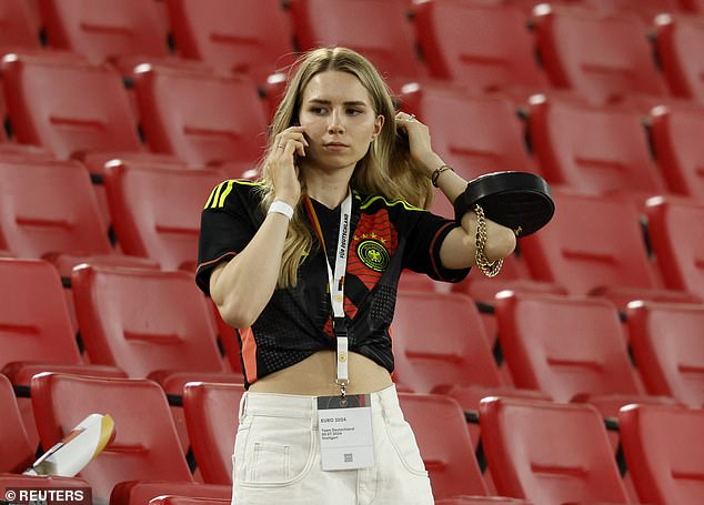 Manuel Neuer's partner Anika Bissel seemed unimpressed during a phone call in the stands