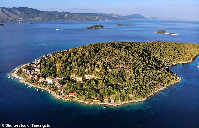 Vrnik in Croatia, above, offers 'a Mediterranean postcard landscape where seeing a pod of dolphins is nothing unusual'