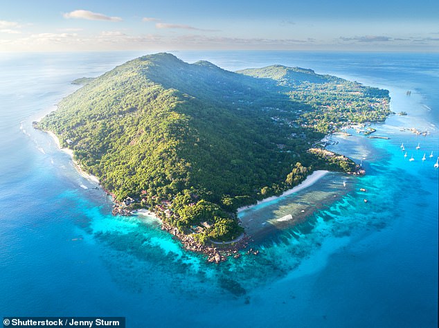 La Digue, pictured, 'has beaches that look straight out of a daydream'