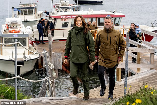 Frederik X, 56, and his wife Mary, 52, grinned for photos in matching waterproof outfits as they explored the south of the island