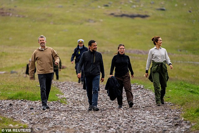 Both looked ready for action in hiking ensembles as they trekked through the countryside. The pair walked to the village along the Kongevejen - a gravel road that takes you from Itilleq to Igaliku, named after Frederick IX who visited in 1952, and is known for its breathtaking views