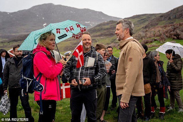 They all had big smiles on their faces as they chatted with well-wishers and were greeted by people carrying Danish and local flags, with beautiful rolling green hills in the background.