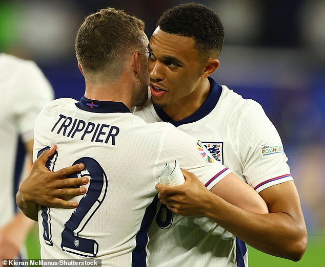 Tripper and Alexander-Arnold pictured embracing after England's 1-0 win over Serbia in Group C