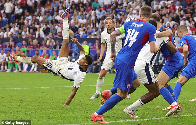 John Stones spoke this week about how Bellingham's (left) goal against Slovakia 'could be the spark the team needed'