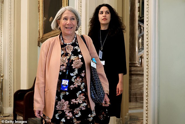 Anita Dunn (left), senior adviser to President Joe Biden, and White House Deputy Director of Legislative Affairs Reema Dodin